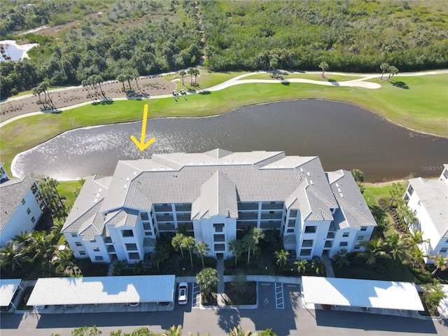 birds eye view of property with golf course view