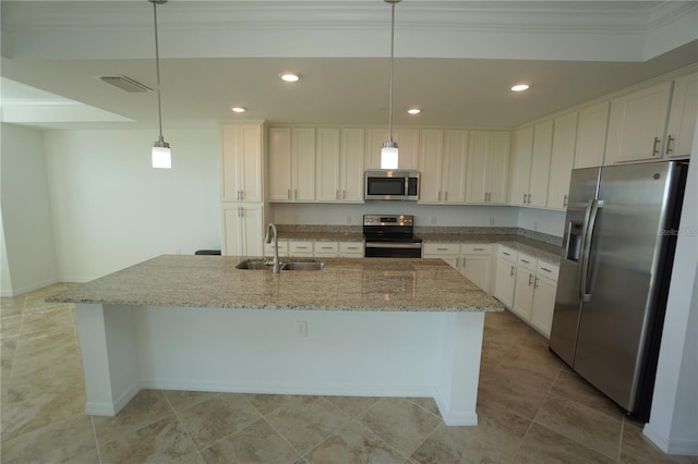 kitchen featuring stainless steel appliances, a sink, decorative light fixtures, and white cabinets