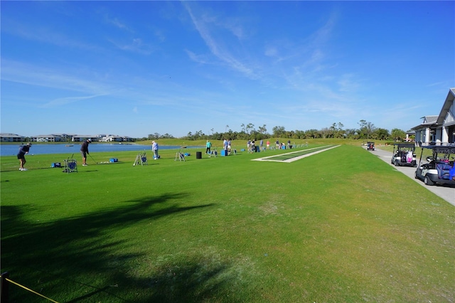 view of community with a water view