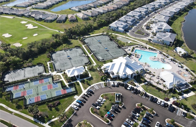 aerial view featuring a water view and a residential view