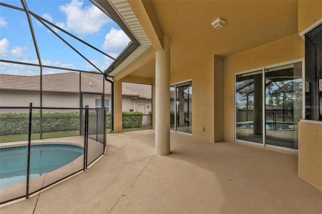 view of swimming pool with a lanai, a fenced in pool, and a patio