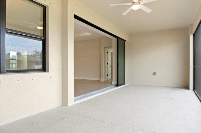 interior space featuring a ceiling fan