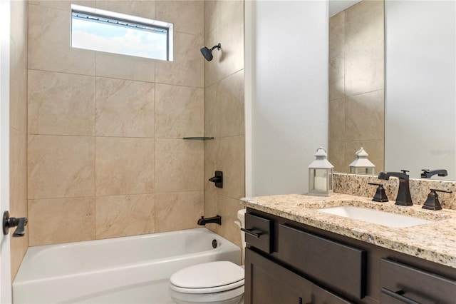 full bath featuring bathing tub / shower combination, toilet, and vanity