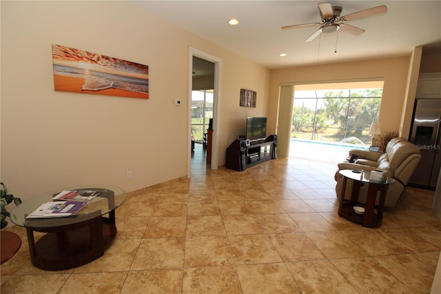 living room with ceiling fan, light tile patterned floors, and recessed lighting