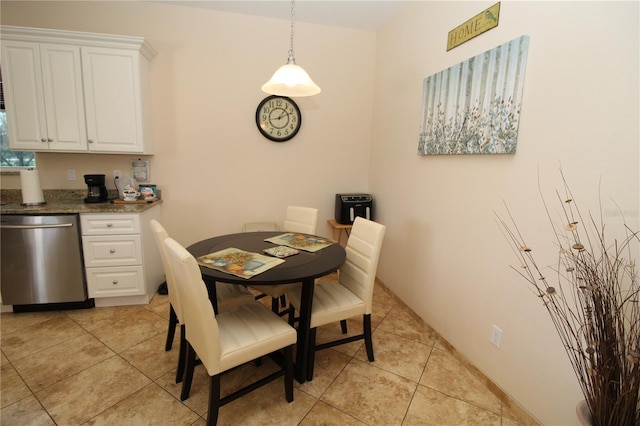 dining room featuring light tile patterned floors