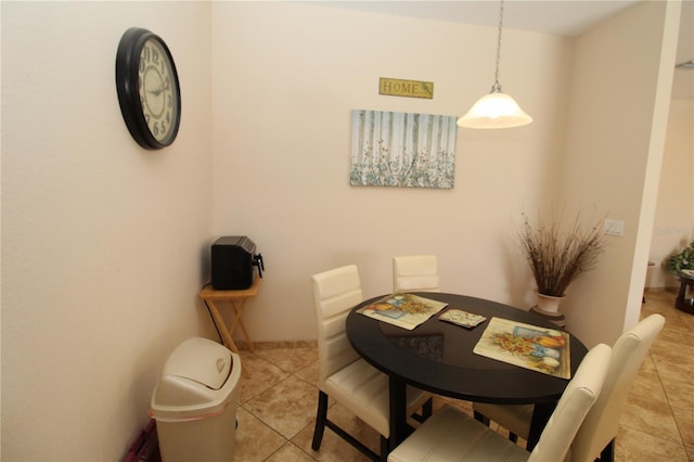 dining room featuring light tile patterned floors