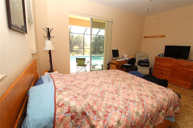 tiled bedroom with access to exterior and a sunroom