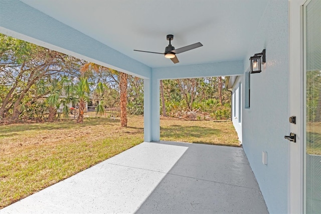 view of patio featuring a ceiling fan