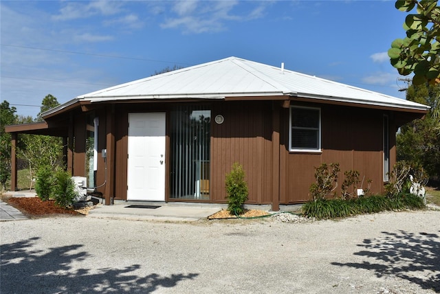 view of front of house featuring metal roof