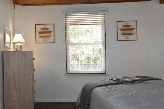 bedroom featuring baseboards