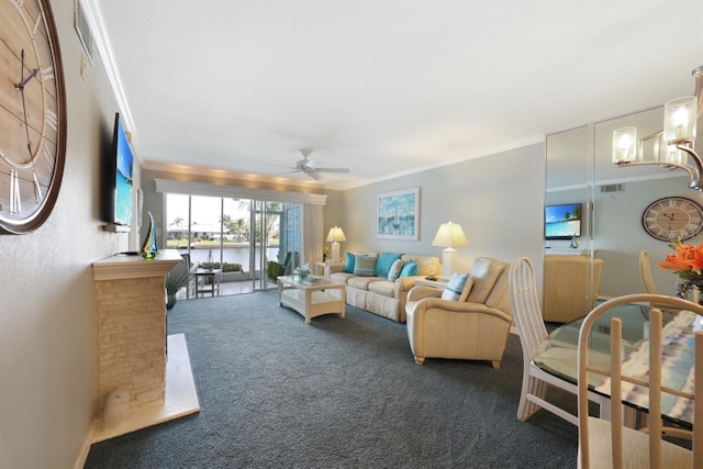 living room featuring visible vents, dark carpet, a ceiling fan, and ornamental molding