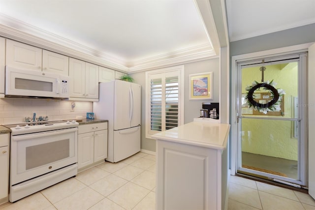 kitchen featuring white appliances, light tile patterned floors, white cabinetry, and ornamental molding