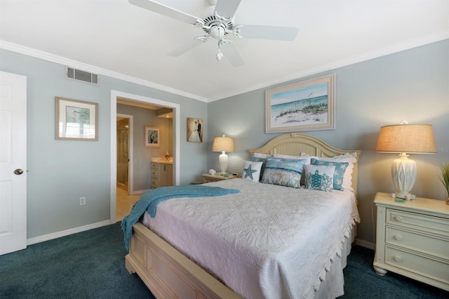 bedroom with baseboards, visible vents, ensuite bath, dark colored carpet, and crown molding