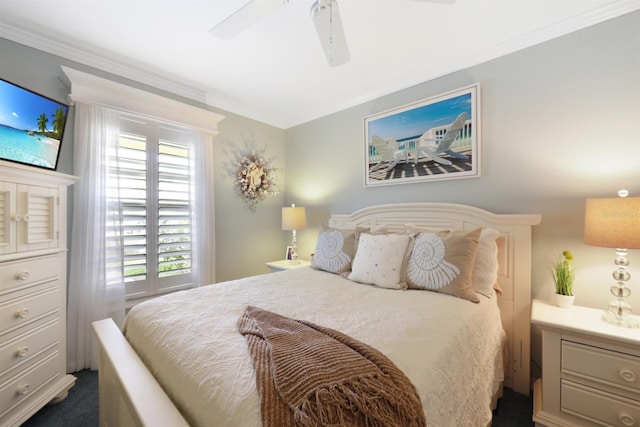 bedroom featuring a ceiling fan and crown molding