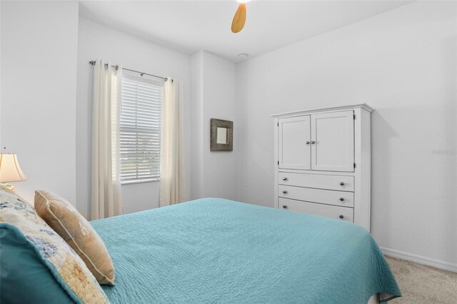14724 Cherry Blossom Way, Punta Gorda, FL 33955 - carpeted bedroom featuring baseboards and a ceiling fan