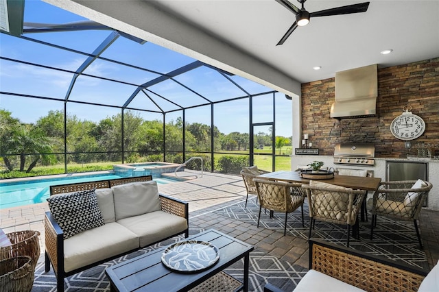 14724 Cherry Blossom Way, Punta Gorda, FL 33955 - view of patio / terrace with a lanai, a grill, exterior kitchen, a pool with connected hot tub, and an outdoor living space