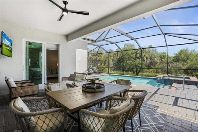 14724 Cherry Blossom Way, Punta Gorda, FL 33955 - view of patio featuring a ceiling fan, a pool with connected hot tub, and glass enclosure