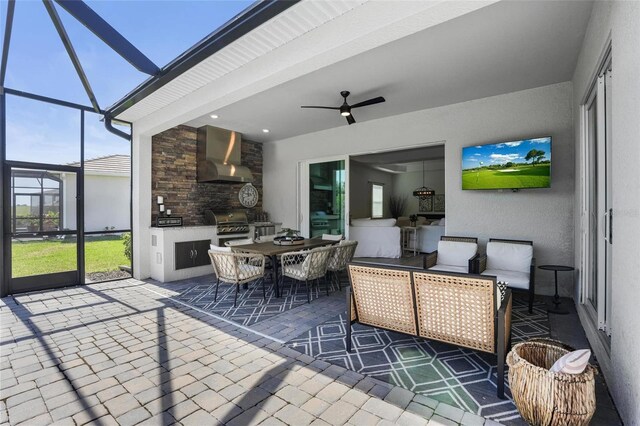 14724 Cherry Blossom Way, Punta Gorda, FL 33955 - sunroom / solarium with a fireplace and a ceiling fan