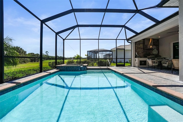 14724 Cherry Blossom Way, Punta Gorda, FL 33955 - view of pool featuring a pool with connected hot tub, glass enclosure, a patio, and area for grilling