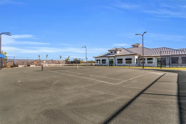 14724 Cherry Blossom Way, Punta Gorda, FL 33955 - view of tennis court featuring fence
