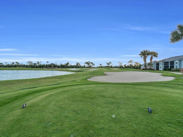14724 Cherry Blossom Way, Punta Gorda, FL 33955 - view of home's community featuring a water view and a lawn