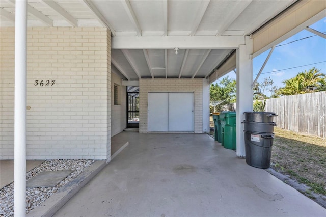 garage featuring fence