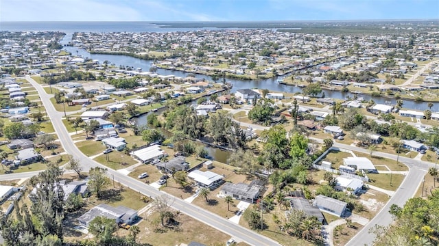 aerial view with a water view and a residential view