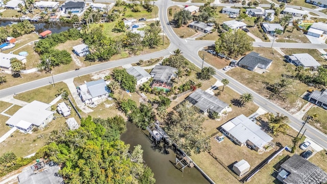 aerial view featuring a residential view and a water view