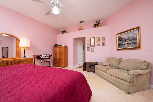 bedroom with baseboards, visible vents, a ceiling fan, and light colored carpet