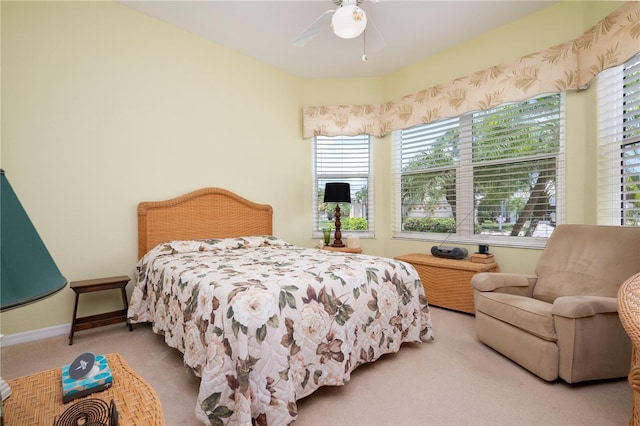 bedroom with carpet flooring, ceiling fan, and baseboards