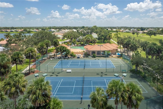 view of tennis court with fence