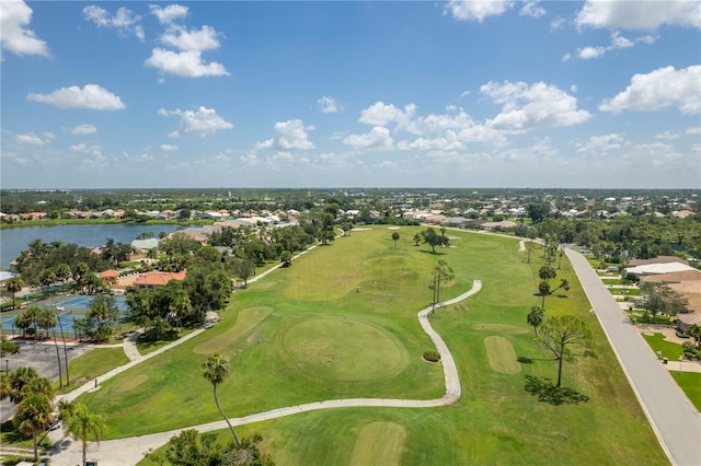 aerial view with a water view and golf course view