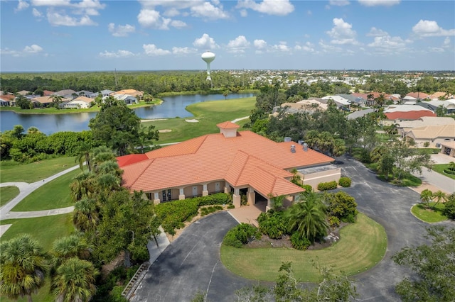 birds eye view of property with a residential view and a water view