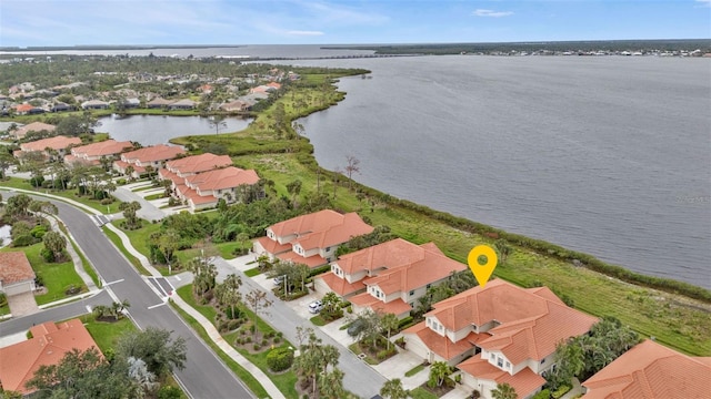 aerial view featuring a water view and a residential view