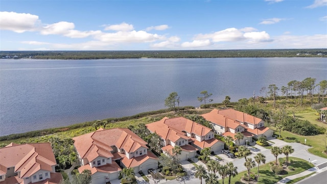 aerial view with a water view and a residential view