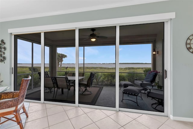 interior space featuring a ceiling fan and a healthy amount of sunlight