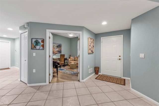 entrance foyer featuring recessed lighting, baseboards, visible vents, and light tile patterned flooring