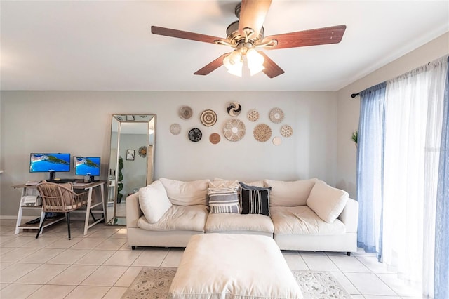 living room featuring light tile patterned floors and a ceiling fan