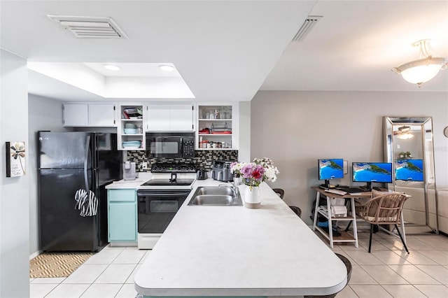 kitchen with open shelves, light countertops, white cabinets, a sink, and black appliances