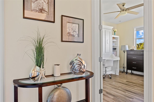 hallway featuring light wood-style floors