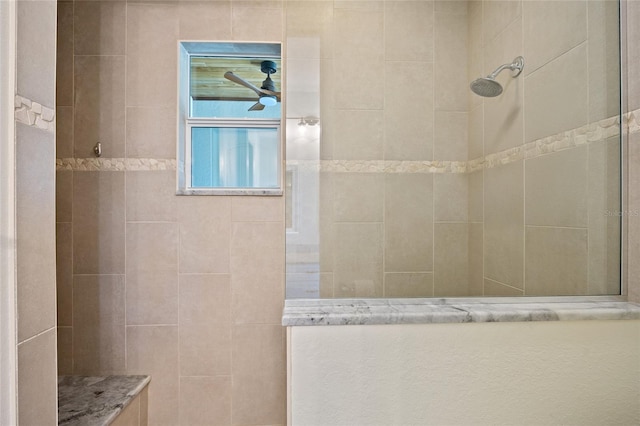 full bath featuring ceiling fan and walk in shower