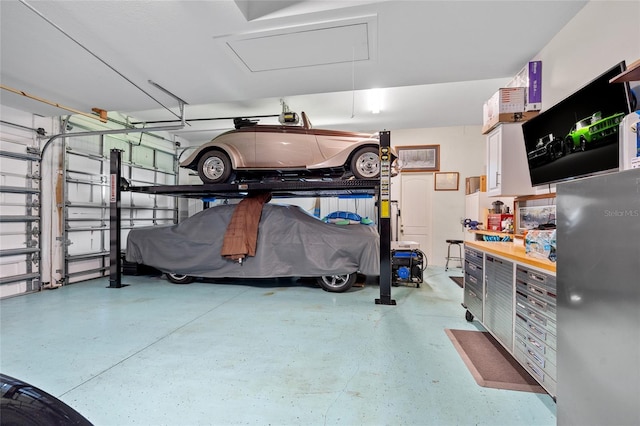 garage featuring a garage door opener