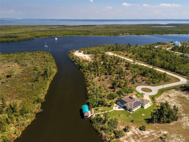 bird's eye view with a water view