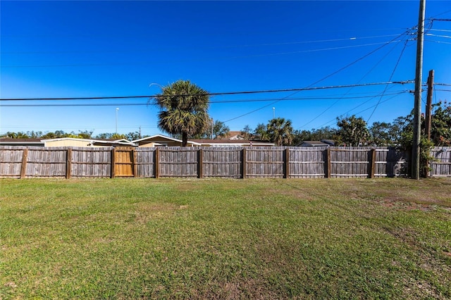 view of yard with fence