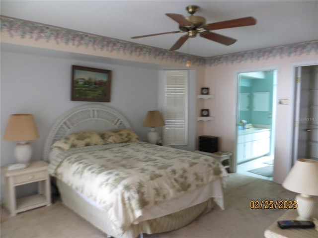 bedroom with a ceiling fan and light colored carpet