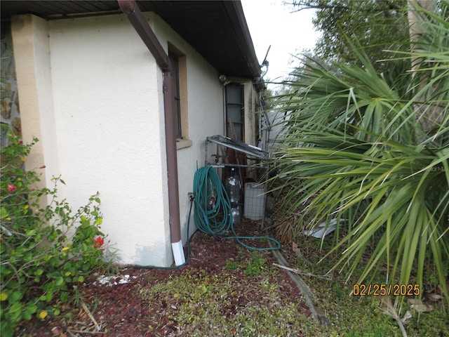 view of home's exterior with stucco siding