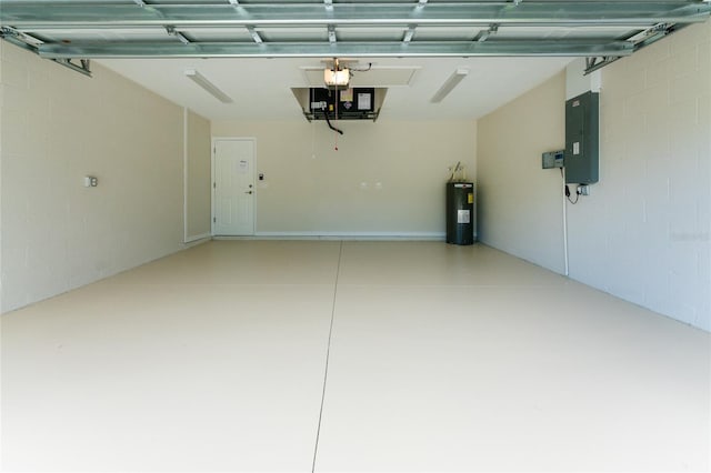 garage featuring a garage door opener, concrete block wall, electric panel, and electric water heater