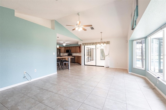 unfurnished living room featuring high vaulted ceiling, visible vents, baseboards, and light tile patterned floors