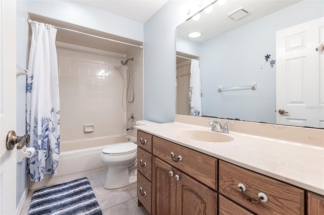 bathroom featuring visible vents, toilet, shower / tub combo with curtain, tile patterned flooring, and vanity