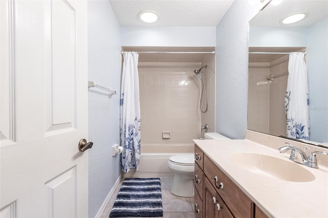 full bathroom featuring toilet, shower / bath combo with shower curtain, vanity, a textured ceiling, and tile patterned floors